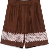 Shorts con stampa grafica in marrone Feng chen wang - uomo 