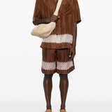 Shorts con stampa grafica in marrone Feng chen wang - uomo 