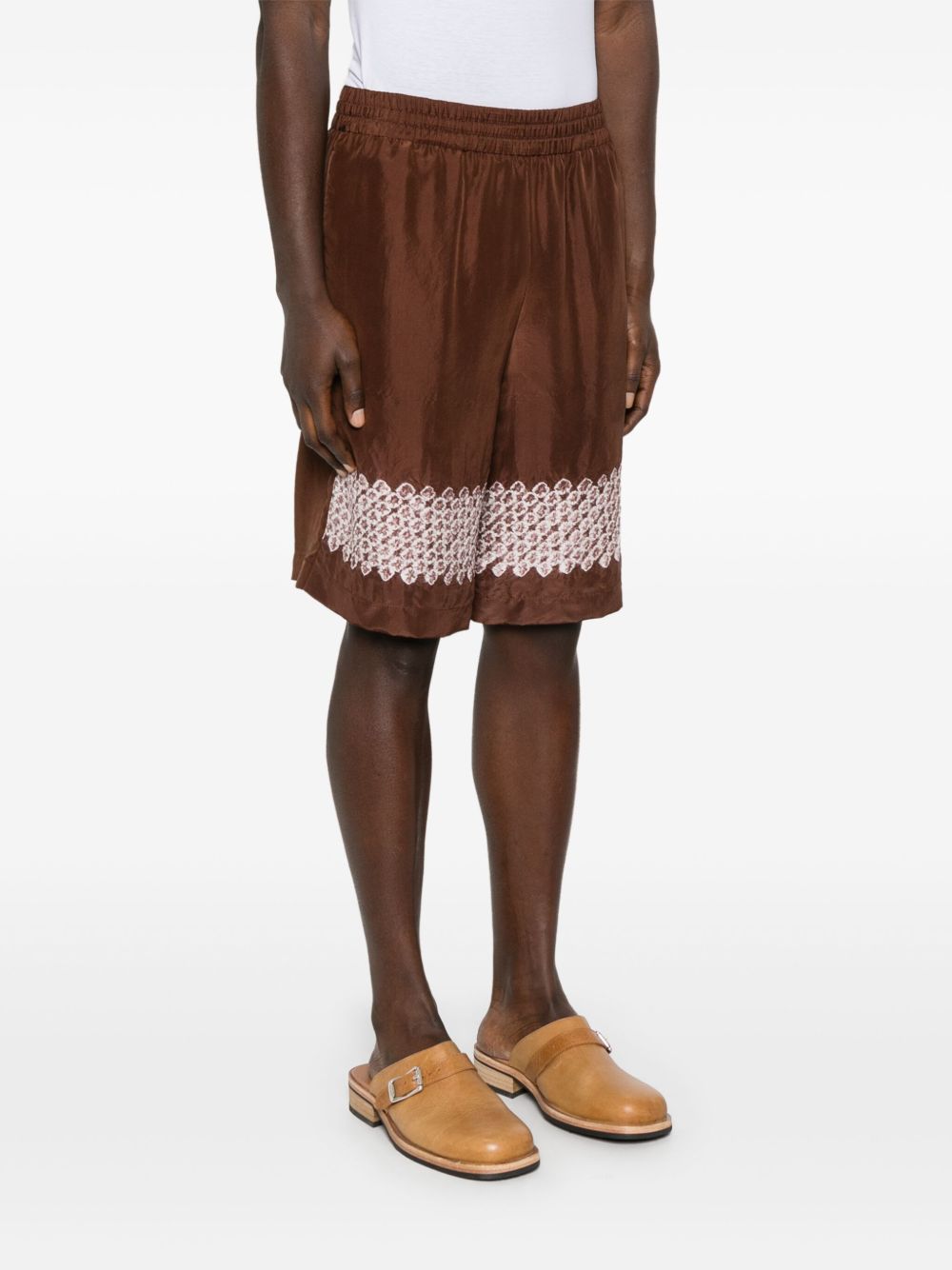 Shorts con stampa grafica in marrone Feng chen wang - uomo 