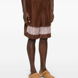 Shorts con stampa grafica in marrone Feng chen wang - uomo 