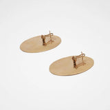 Orecchini rotondi con logo in oro Jil Sander - donna 