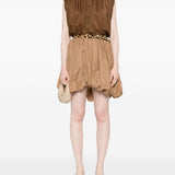 Blusa smanicata in marrone 