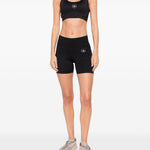 Top sportivo con logo in nero Adidas by stella mc cartney  - donna 