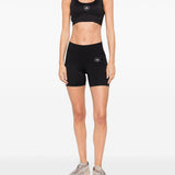 Top sportivo con logo in nero Adidas by stella mc cartney  - donna 