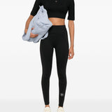 Leggings con logo in nero Adidas by stella mc cartney - donna 