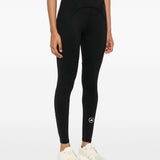 Leggings con logo in nero Adidas by stella mc cartney - donna 