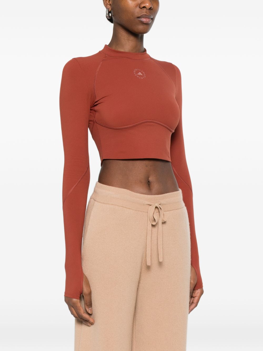 Top crop sportivo a maiche lunghe in marrone 