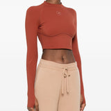 Top crop sportivo a maiche lunghe in marrone 