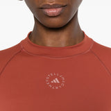Top crop sportivo a maiche lunghe in marrone 