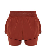 Shorts 2 in 1 con logo in rosso terracotta Adidas by Stella Mc Cartney - donna 