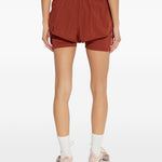 Shorts 2 in 1 con logo in rosso terracotta Adidas by Stella Mc Cartney - donna 
