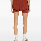 Shorts 2 in 1 con logo in rosso terracotta Adidas by Stella Mc Cartney - donna 