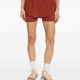 Shorts 2 in 1 con logo in rosso terracotta Adidas by Stella Mc Cartney - donna 