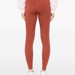 Leggings con logo in rosso terracotta Adidas by Stella Mc Cartney - donna 