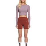 Aboito sportivo con shorts in rosso mattone Adidas by stella MC Cartney - donna 