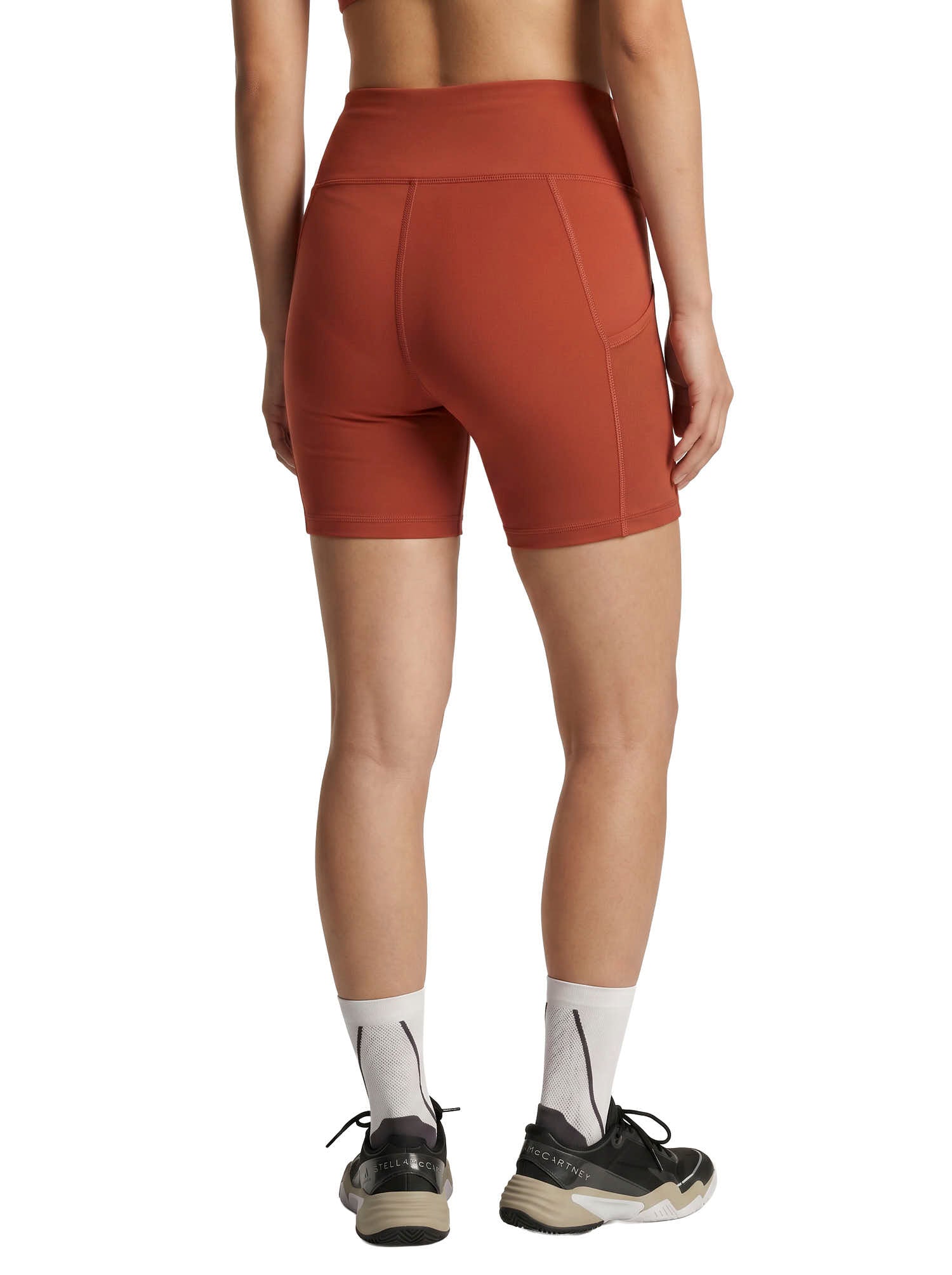 Aboito sportivo con shorts in rosso mattone Adidas by stella MC Cartney - donna 