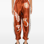 Pantaloni Soleil D'Amour con stampa in arancione Alemais - donna 