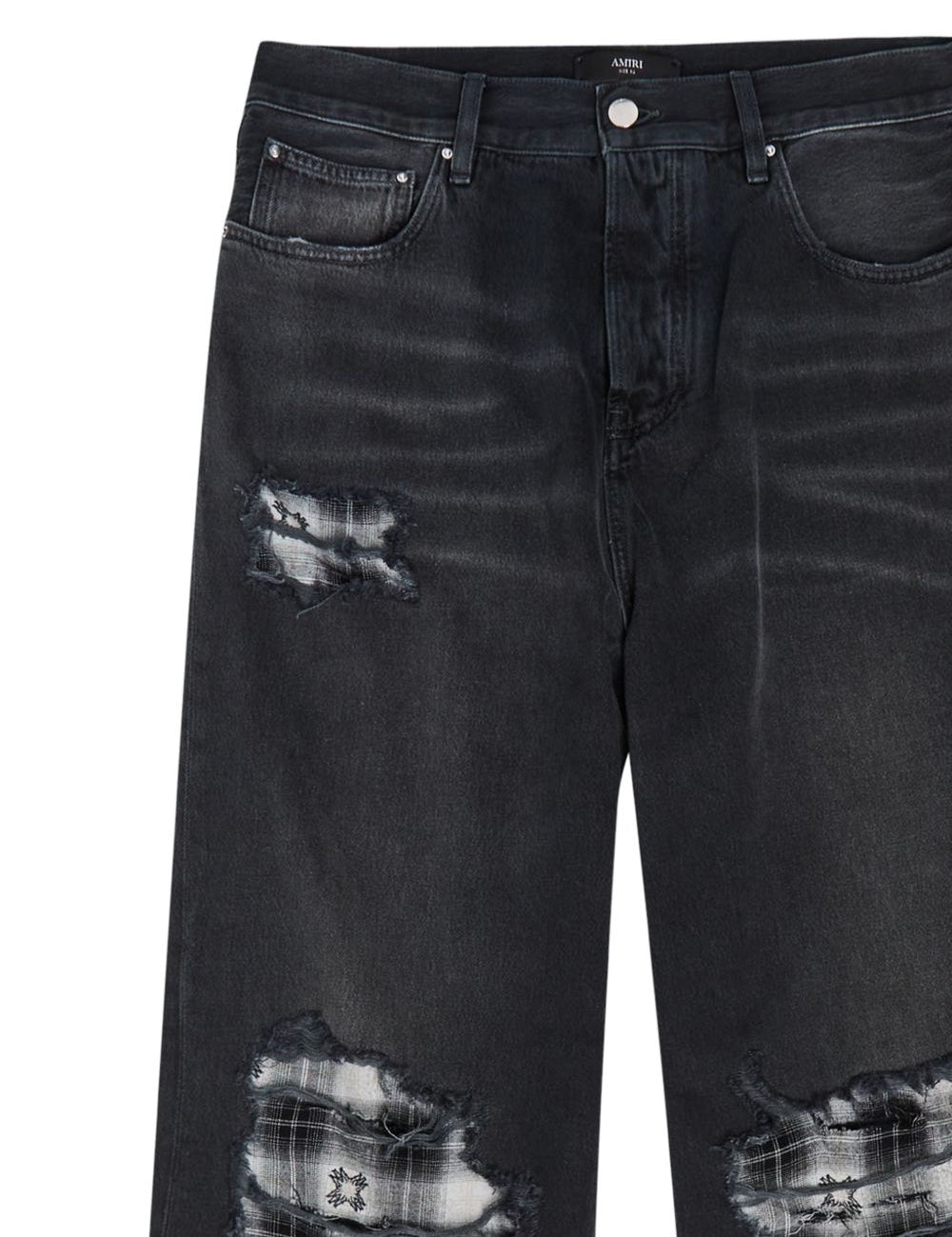 Jeans Funnel Repair con effetto vissuto in nero Amiri - uomo 