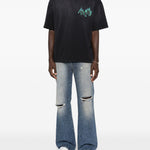 Jeans bootcut in blu Amiri - uomo 