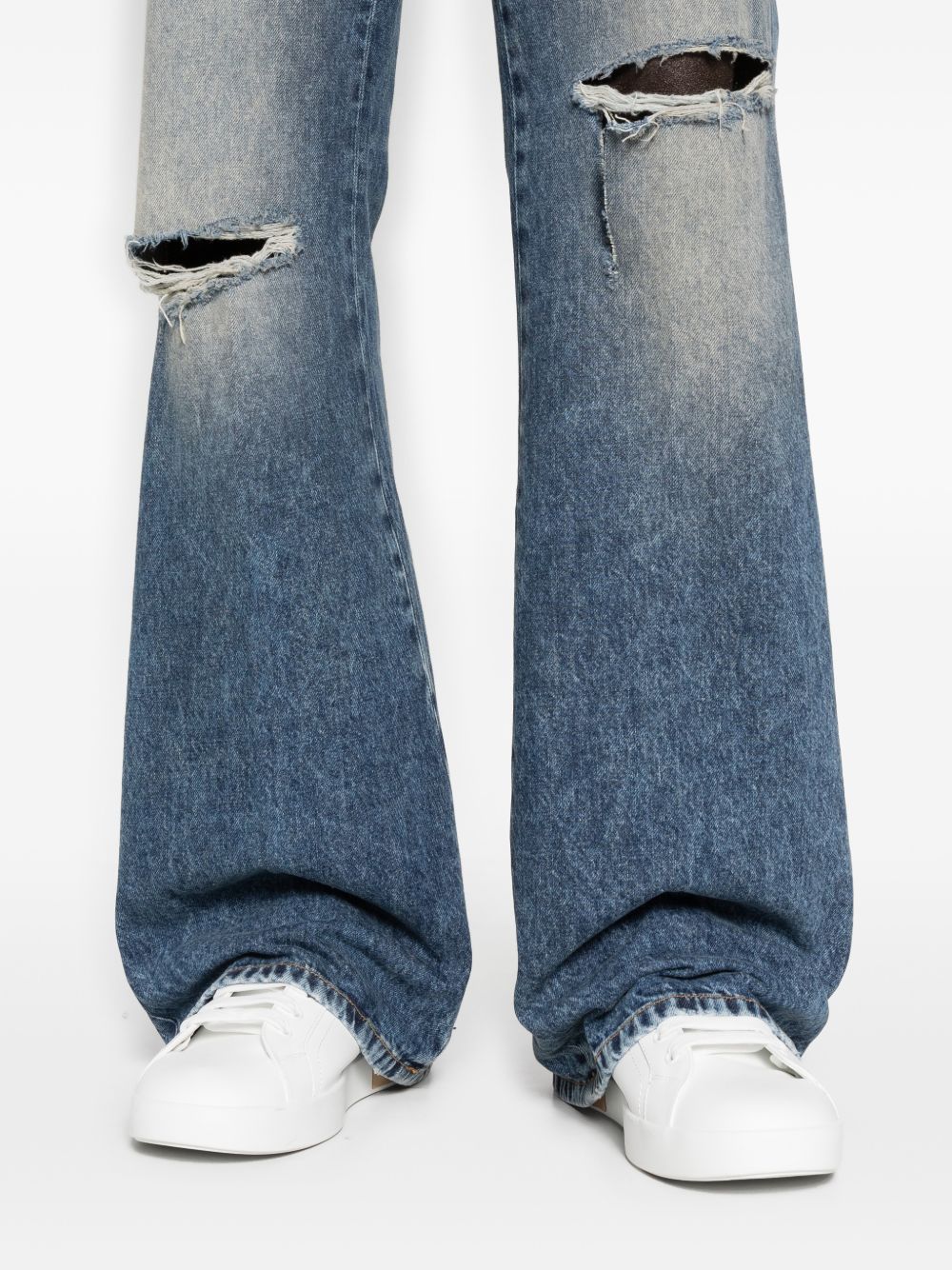 Jeans bootcut in blu Amiri - uomo 