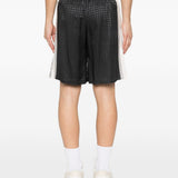 Pantaloncini con coulisse a quadri in nero Amiri - uomo 