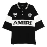 Polo con logo e dettagli a righe in nero e bianco Amiri - uomo 