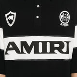 Polo con logo e dettagli a righe in nero e bianco Amiri - uomo 