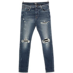 Jeans con strappi in blu Amiri - uomo 