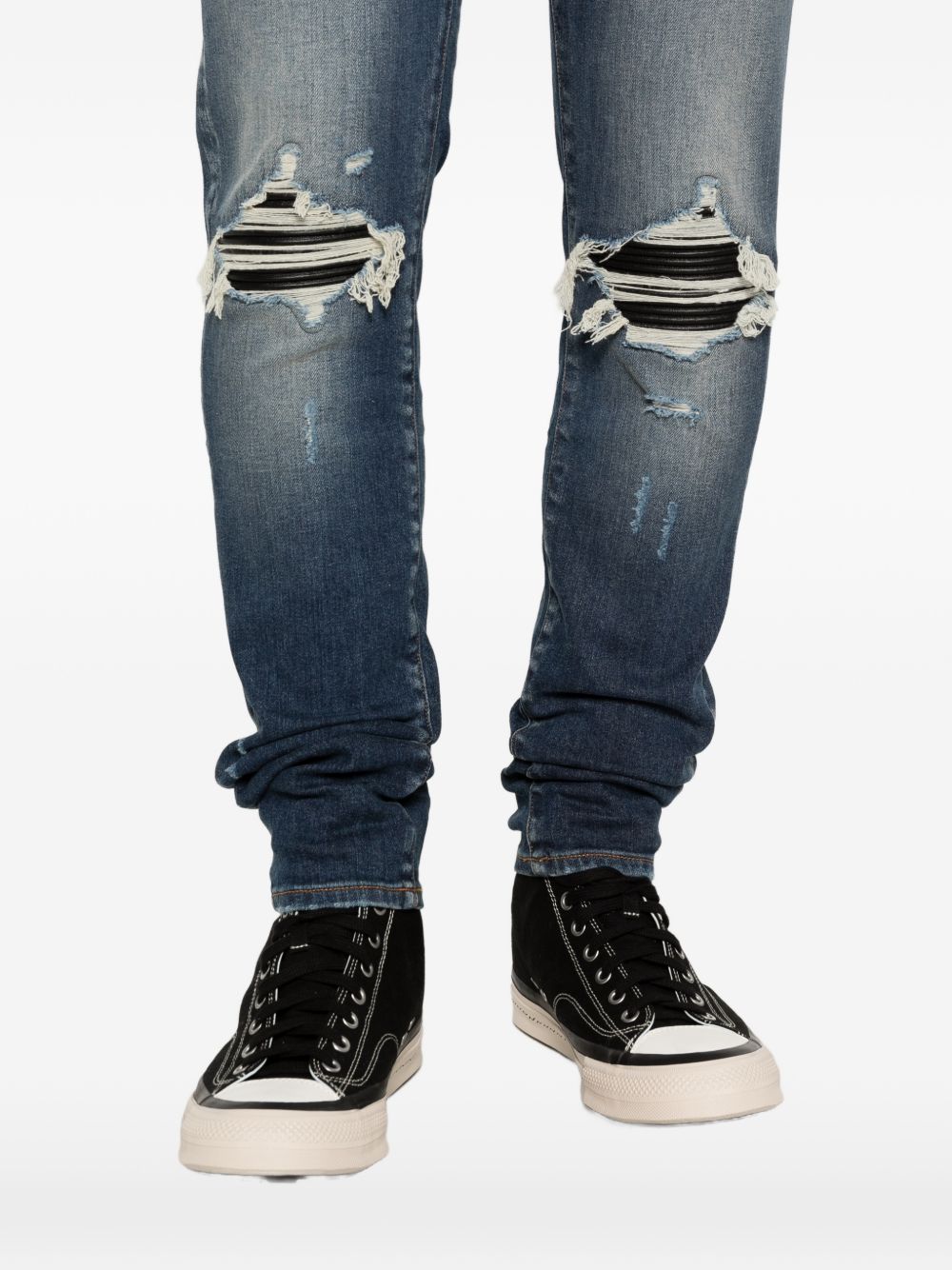 Jeans con strappi in blu Amiri - uomo 