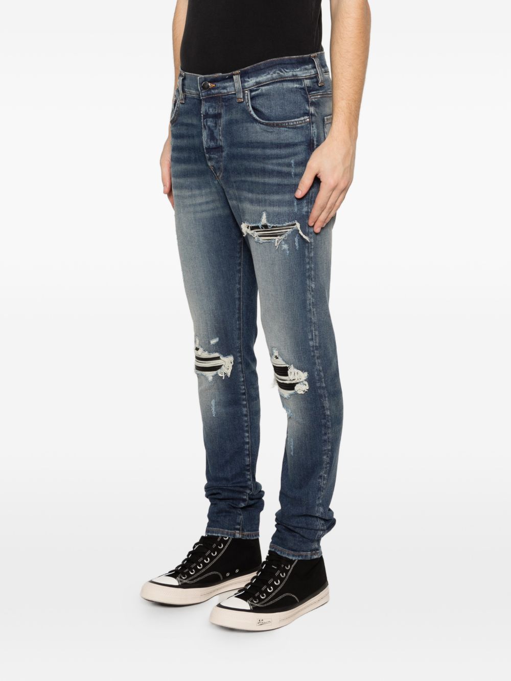 Jeans con strappi in blu Amiri - uomo 