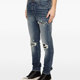 Jeans con strappi in blu Amiri - uomo 