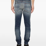 Jeans con strappi in blu Amiri - uomo 