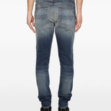 Jeans con strappi in blu Amiri - uomo 