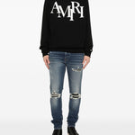 Jeans con strappi in blu Amiri - uomo 