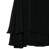 Top con ruchesi in nero 