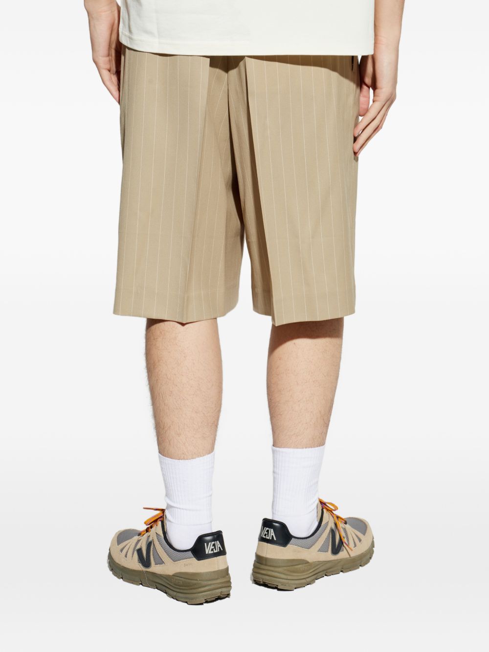 Shorts gessati con pieghe in beige Ami paris - uomo 