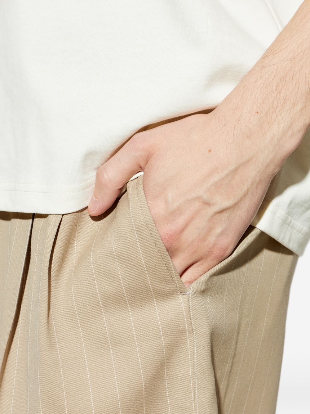 Shorts gessati con pieghe in beige Ami paris - uomo 