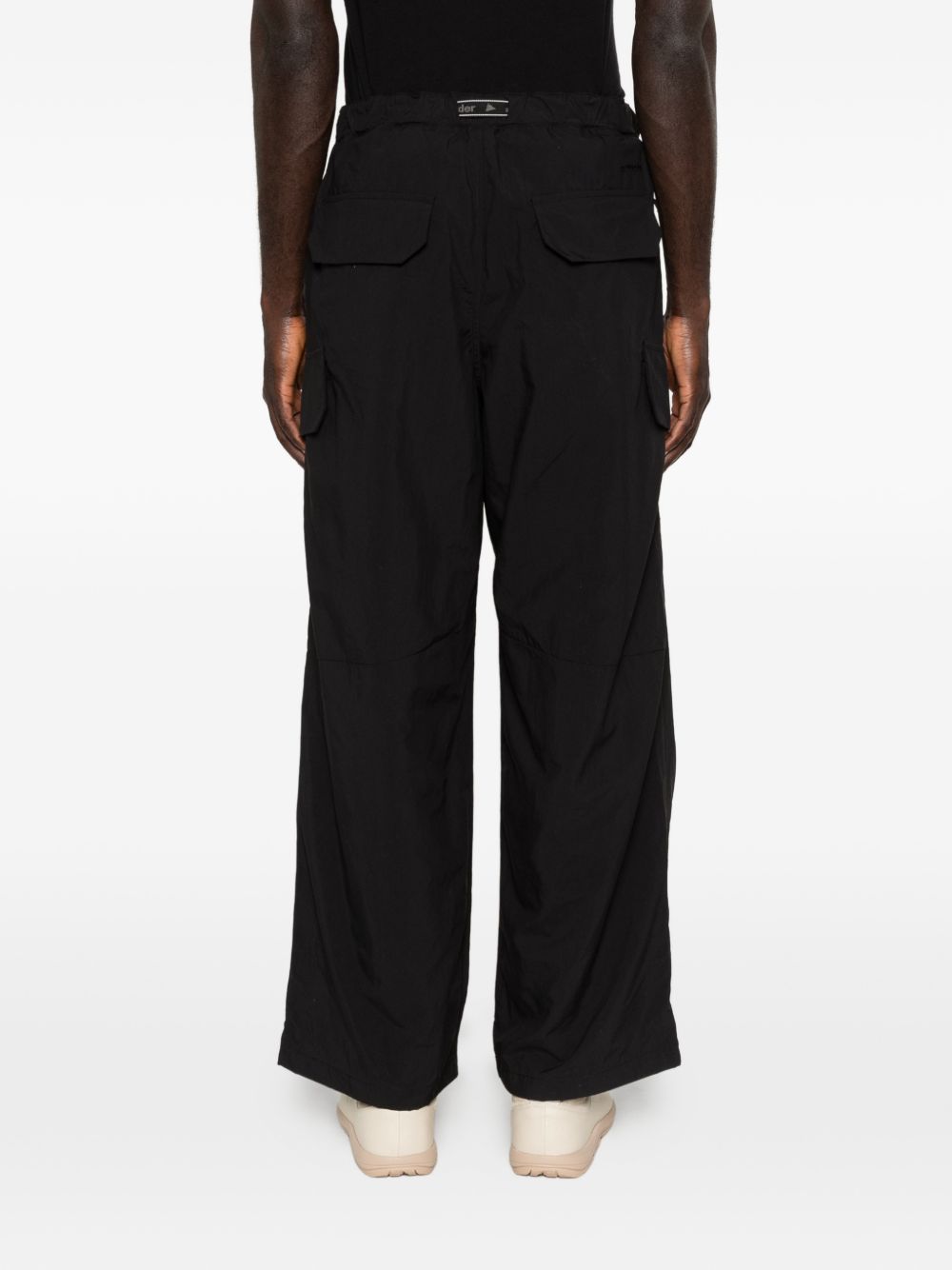 Pantaloni con tasche in nero and Wander - uomo 