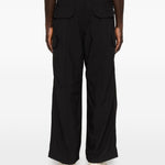 Pantaloni con tasche in nero and Wander - uomo 