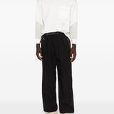 Pantaloni con tasche in nero and Wander - uomo 