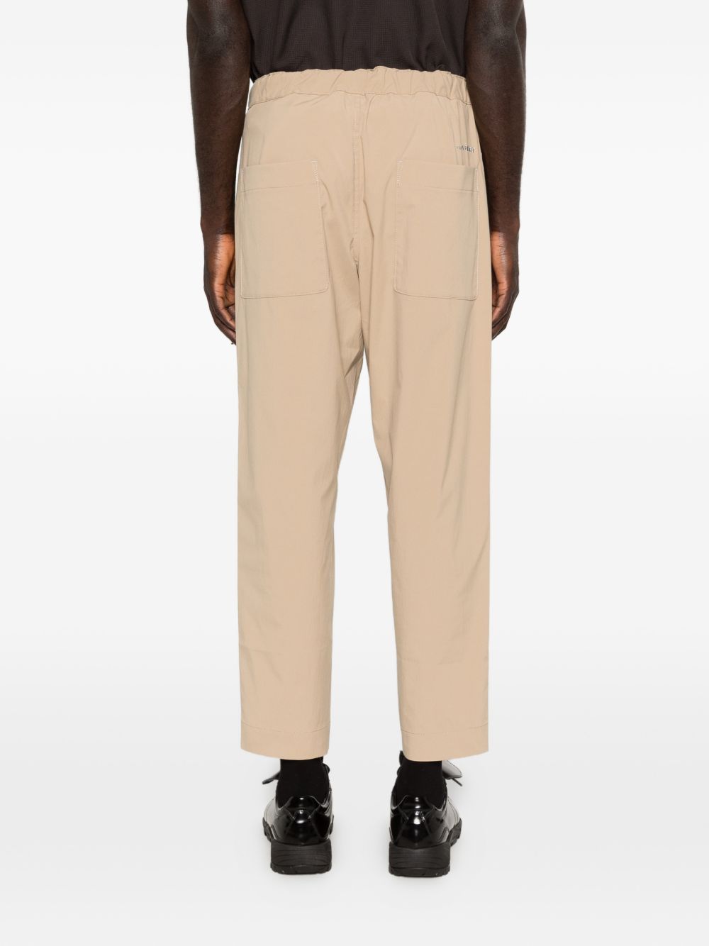 Pantaloni con tasche in beige and Wander - uomo 