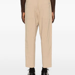 Pantaloni con tasche in beige and Wander - uomo 