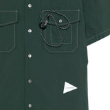 Camicia a maniche corte con moschettone in verde And wander - uomo 