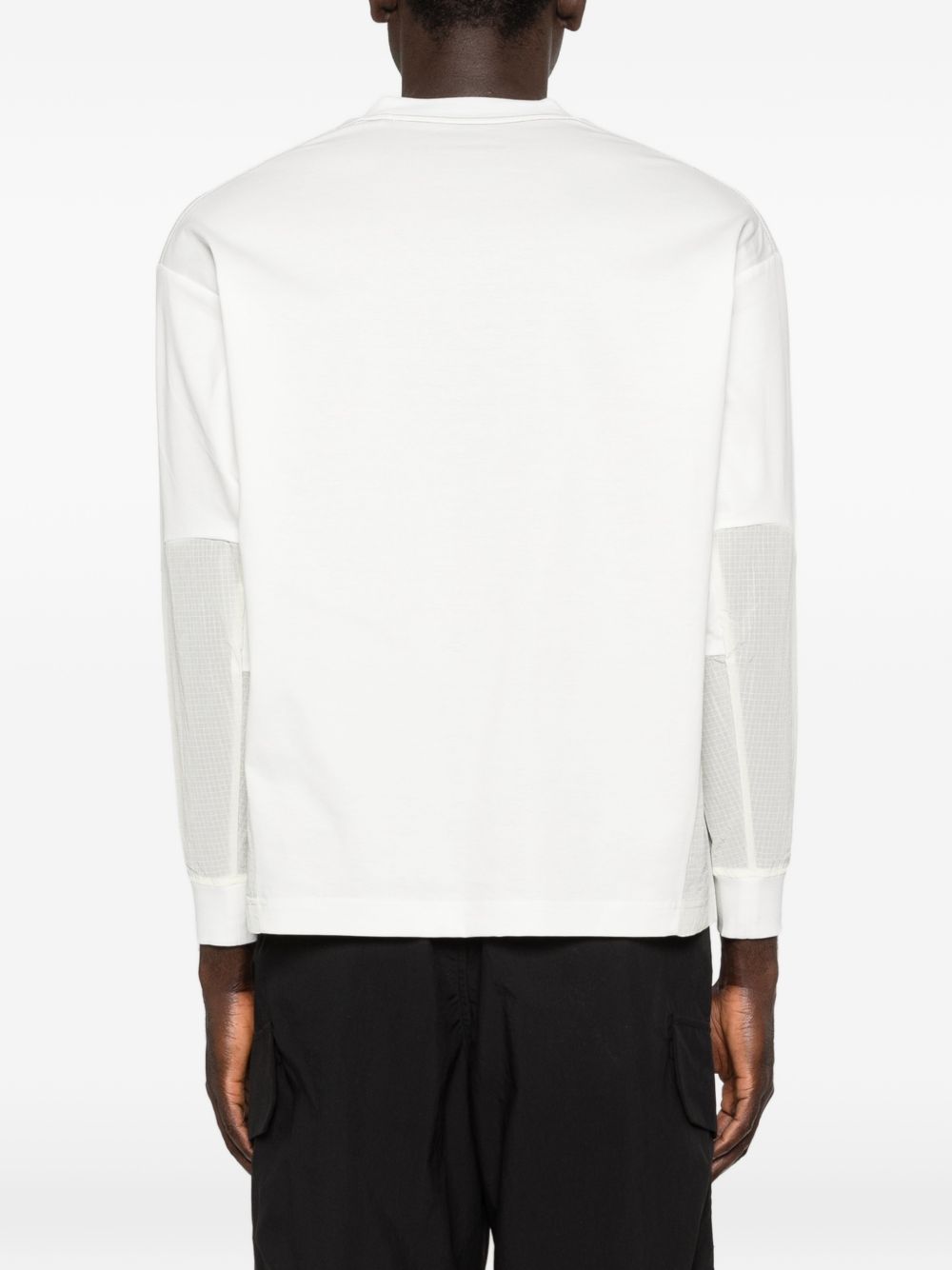 T-shirt a maniche lunghe con tasca in bianco And wander - uomo 