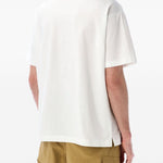 T-shirt con tasca a patta in bianco And wander - uomo 