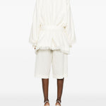 Cappotto con frange e cintura in bianco Batakovic - donna 