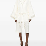 Cappotto con frange e cintura in bianco Batakovic - donna 