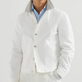 Giubbino in denim con colletto in pelle on bianco 