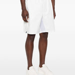 Pantaloncini con stampa logo in bianco Brunello cucinelli - uomo 