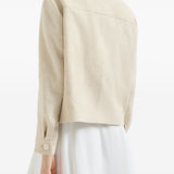 Caban crop con monile in avorio 